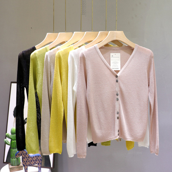 Hétköznapi női mellény hosszú ujjal és spitz nyakkivágással