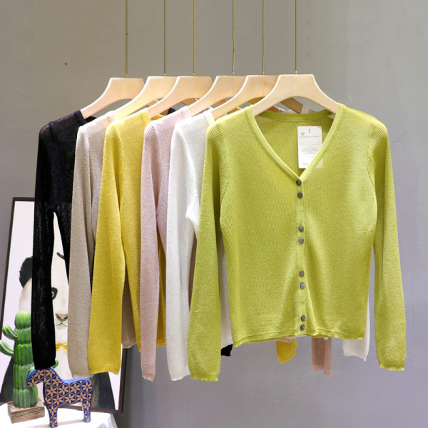 Hétköznapi női mellény hosszú ujjal és spitz nyakkivágással