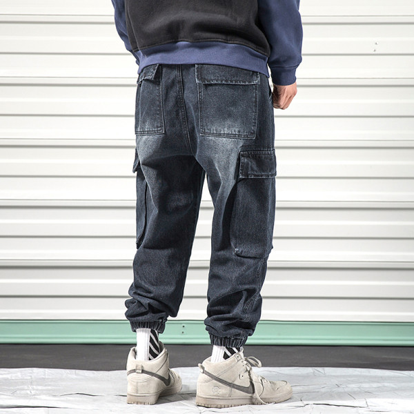 Model larg de blugi barbatesti cu buzunare si elastic