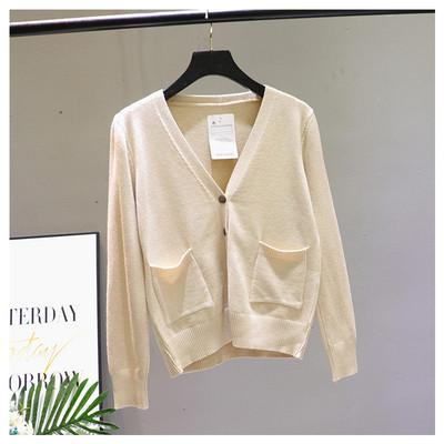 Γυναικεία ζακέτα  με μπροστινές τσέπες και λαιμόκοψη