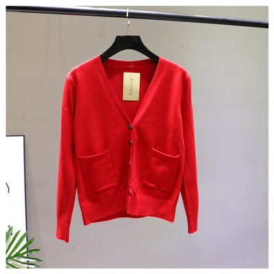 Γυναικεία ζακέτα  με μπροστινές τσέπες και λαιμόκοψη