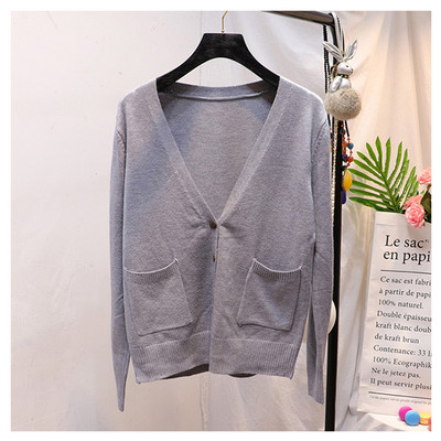 Γυναικεία ζακέτα  με μπροστινές τσέπες και λαιμόκοψη