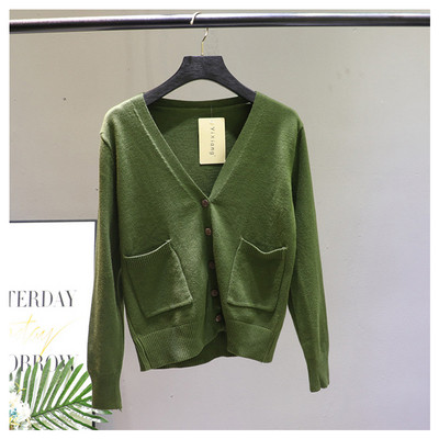 Γυναικεία ζακέτα  με μπροστινές τσέπες και λαιμόκοψη