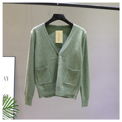 Γυναικεία ζακέτα  με μπροστινές τσέπες και λαιμόκοψη