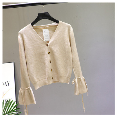 Női mellény lótusz ujjal és spitz nyakkivágással