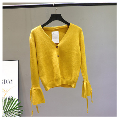 Női mellény lótusz ujjal és spitz nyakkivágással