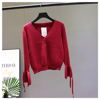 Női mellény lótusz ujjal és spitz nyakkivágással