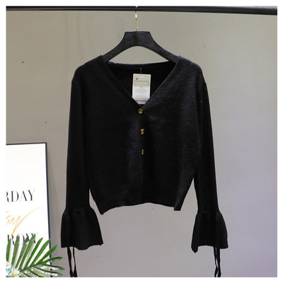 Női mellény lótusz ujjal és spitz nyakkivágással