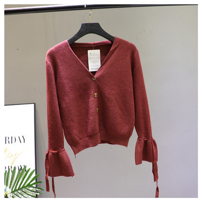 Női mellény lótusz ujjal és spitz nyakkivágással