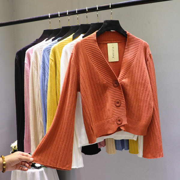 Moderna sieviešu veste ar lotosa piedurknēm un špica kakla izgriezumu