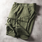 Ανδρικά παντελόνια 3/4 με τσέπες και πράσινο χρώμα