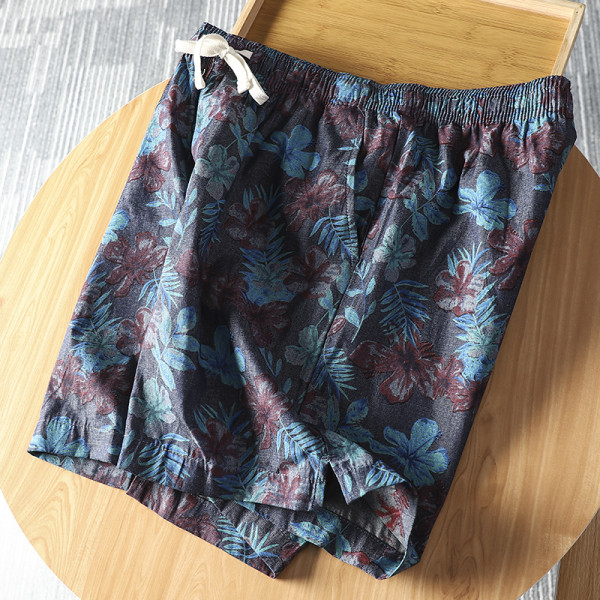 Férfi fürdőruha virágmintával és nyakkendővel