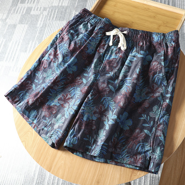 Férfi fürdőruha virágmintával és nyakkendővel