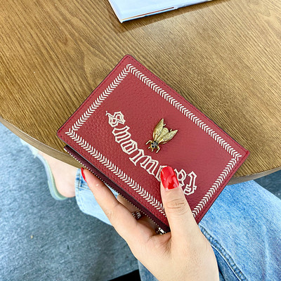 Portofel de dama cu broderie si decor metalic