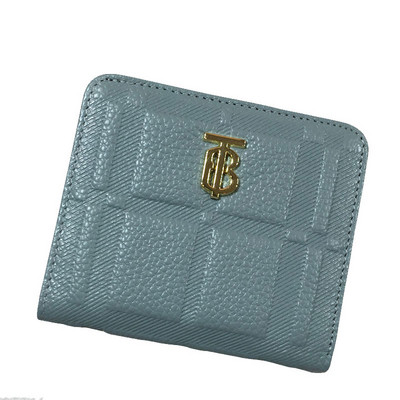 Γυναικείο πορτοφόλι από οικολογικό δέρμα με μεταλλικό στοιχείο