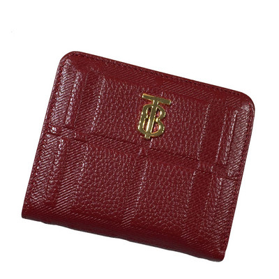 Γυναικείο πορτοφόλι από οικολογικό δέρμα με μεταλλικό στοιχείο