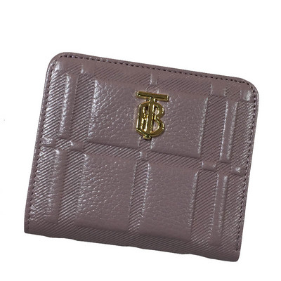 Γυναικείο πορτοφόλι από οικολογικό δέρμα με μεταλλικό στοιχείο