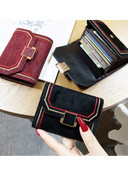 Naiste rahakott metallist kinnituse ja tikandiga