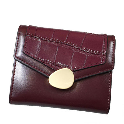 Γυναικείο πορτοφόλι με μεταλλική στερέωση από οικολογικό δέρμα