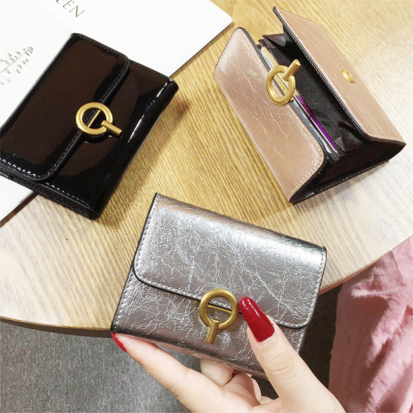 Öko bőrből készült, modern női pénztárca fém rögzítéssel