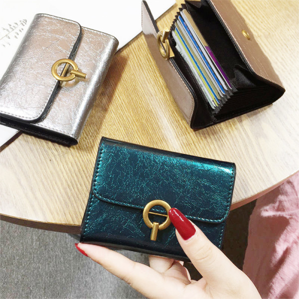 Öko bőrből készült, modern női pénztárca fém rögzítéssel