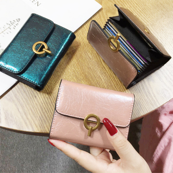 Öko bőrből készült, modern női pénztárca fém rögzítéssel