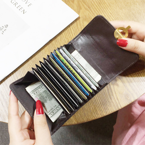 Öko bőrből készült, modern női pénztárca fém rögzítéssel