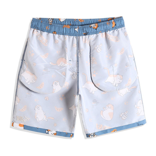 Férfi fürdőruha gyorsan száradó szövet típusú rövidnadrágból kék színben, színes mintával