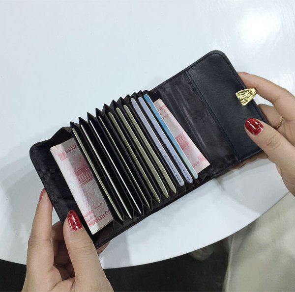 Női mindennapi pénztárca fém temetéssel