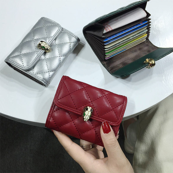 Női mindennapi pénztárca fém temetéssel