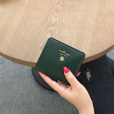 Γυναικείο μοντέρνο πορτοφόλι από οικολογικό δέρμα με μεταλλική στερέωση