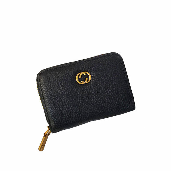 Eko bőrből készült női pénztárca fém díszítéssel és cipzárral