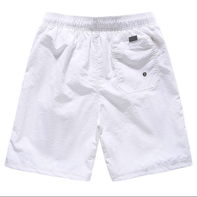 Gyorsan száradó anyagból készült férfi fürdőruha, sima, megkötős modell