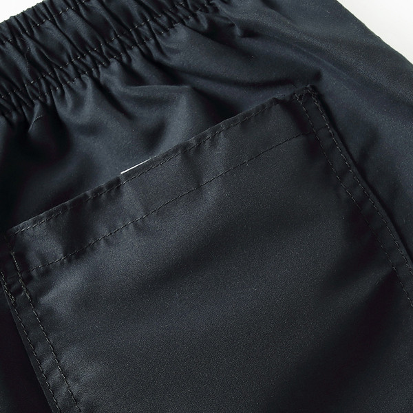 Kiiresti kuivavast kangast meeste ujumistrikoo lühikesed püksid, tavaline mudel