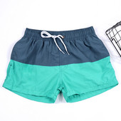 Rannas sobivad elastse vöökohaga meeste lühikesed püksid