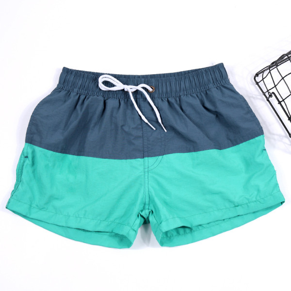 Rannas sobivad elastse vöökohaga meeste lühikesed püksid