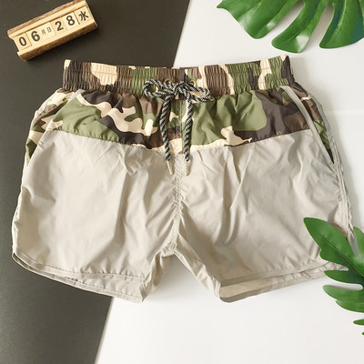 Vīriešu vasaras šorti ar saitēm jostasvietā un kamuflāžu