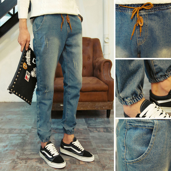 Férfi alkalmi farmernadrág bokánál gumírozással, derékban fűzővel