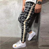 Moodsad meeste pikad ruudulised taskute ja ääristega püksid