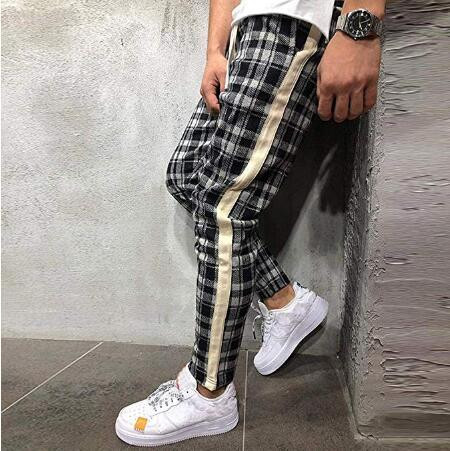 Moodsad meeste pikad ruudulised taskute ja ääristega püksid