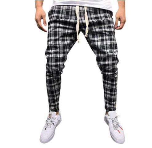 Moodsad meeste pikad ruudulised taskute ja ääristega püksid