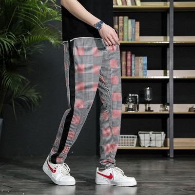 Divatos férfi hosszúnadrág fekete szegéllyel