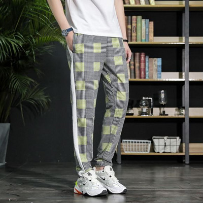 Divatos férfi hosszúnadrág fekete szegéllyel