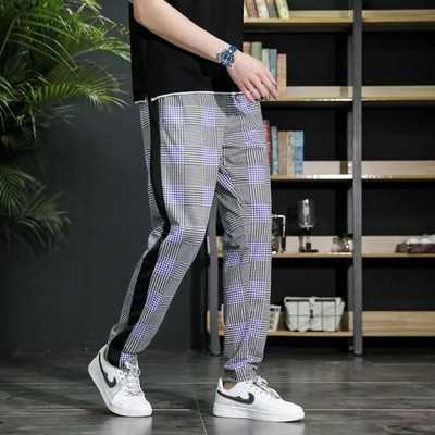 Divatos férfi hosszúnadrág fekete szegéllyel