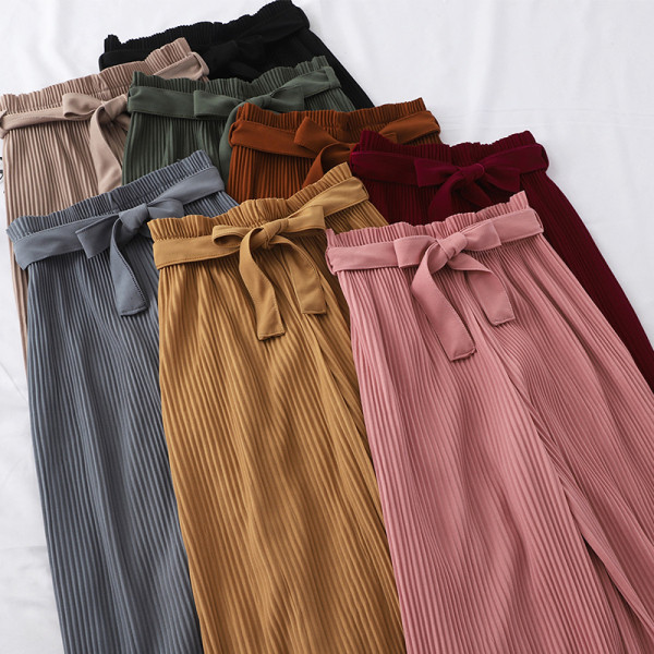 Naiste plisseeritud püksid kõrge vöökoha ja lipsuga