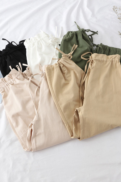 Alkalmi női nadrág nyakkendővel