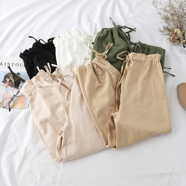 Alkalmi női nadrág nyakkendővel