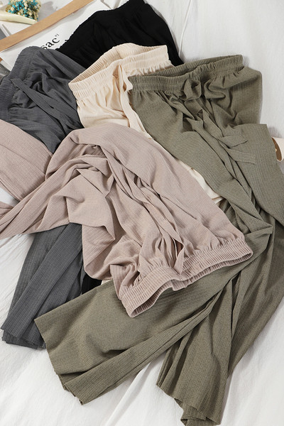 Alkalmi női hosszú nadrág nyakkendővel