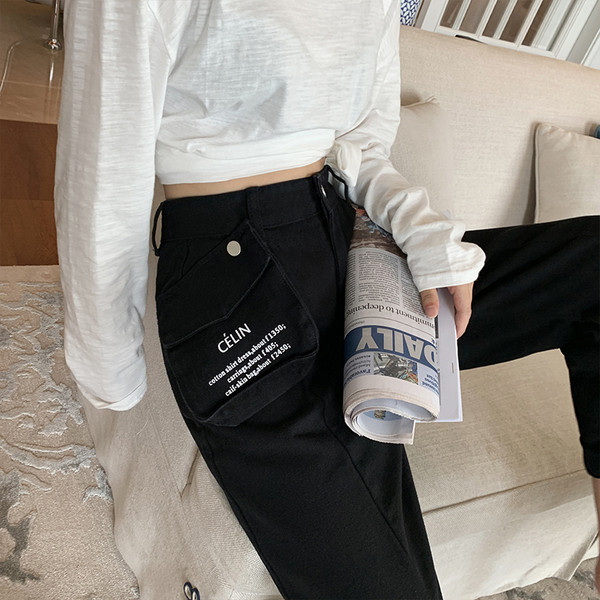 Modern női hosszúnadrág magas derékkal és zsebekkel