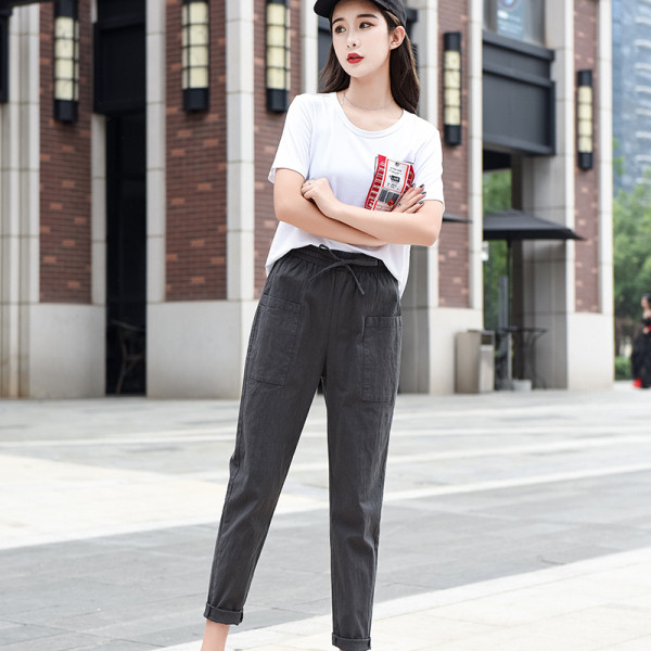 Kõrge vöökoha ja lipsudega vabaaja naistepüksid